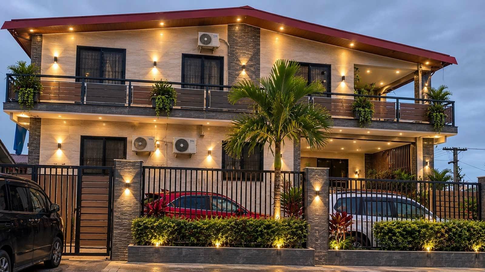 Two-storey home completed by Niqua Investments (Fiji), lit at dusk